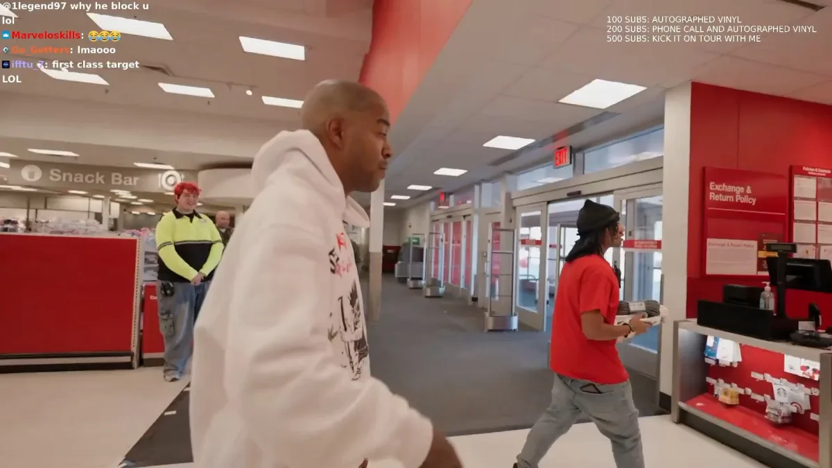 Two men walking inside Target store entrance