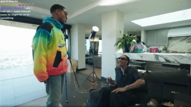 Two men talking in modern apartment living room