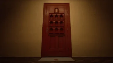 Closed wooden door with decorative carved patterns