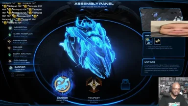 Man playing Starcraft II assembly panel screen