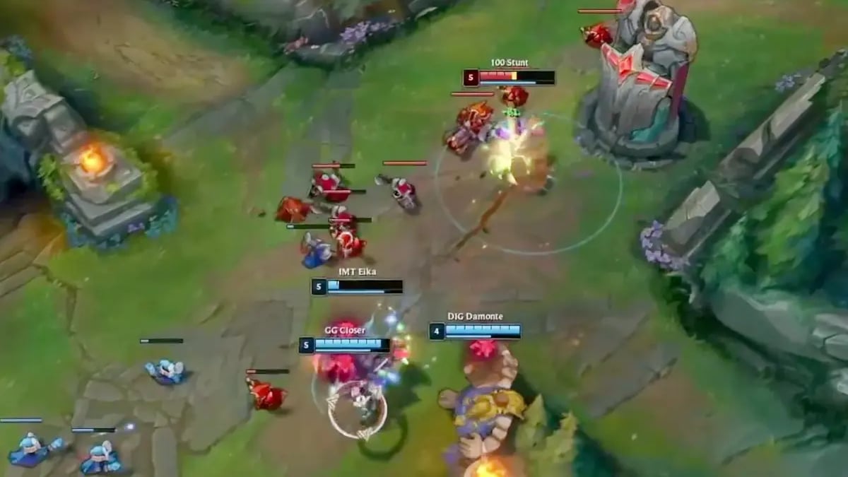 League of Legends teams battle beneath a red turret