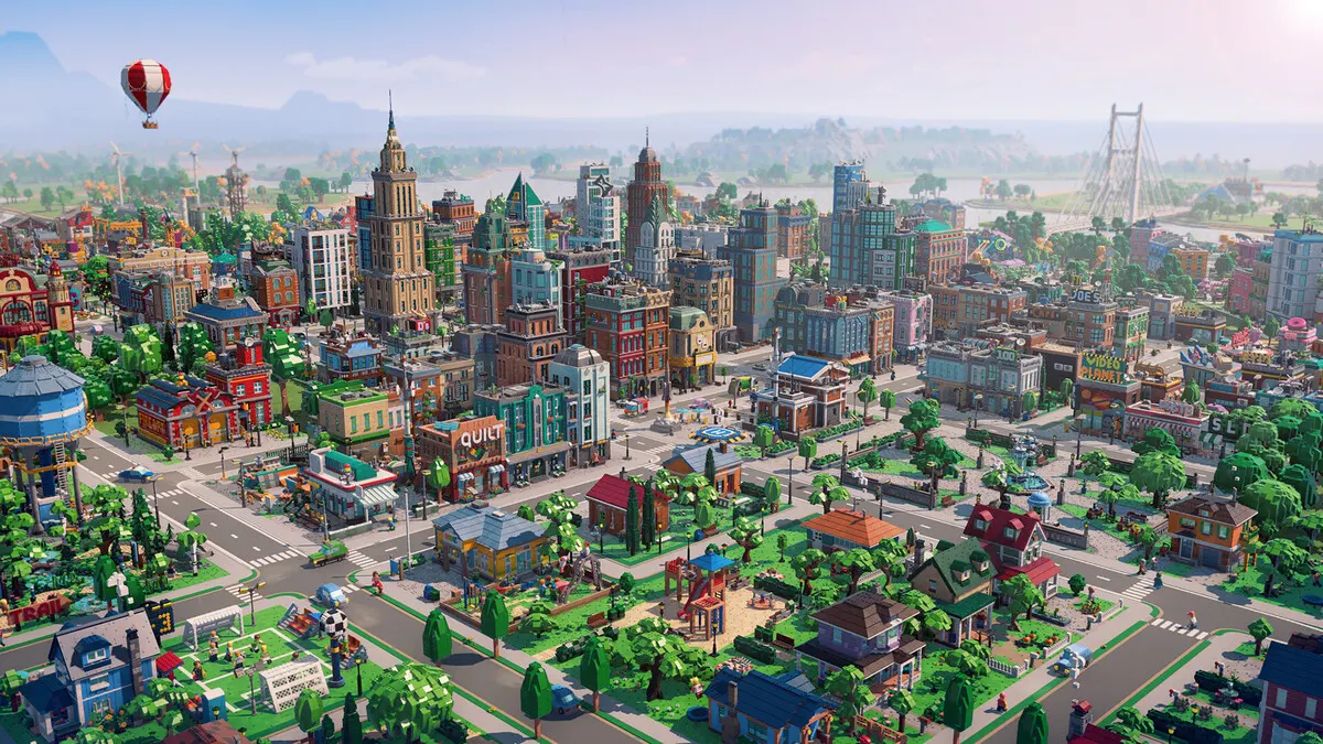 Colorful LEGO-style city skyline with balloon and suspension bridge