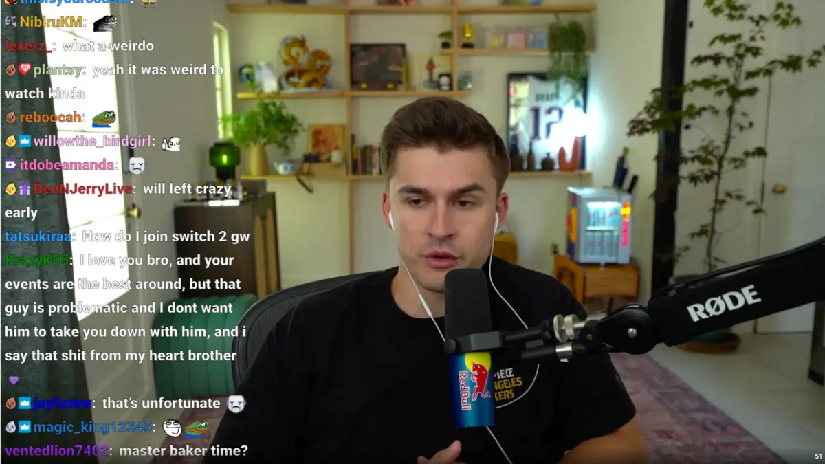 Streamer talking into microphone during live chat.