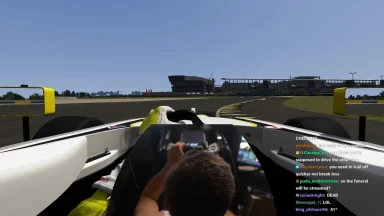 Racing simulator cockpit view on virtual racetrack