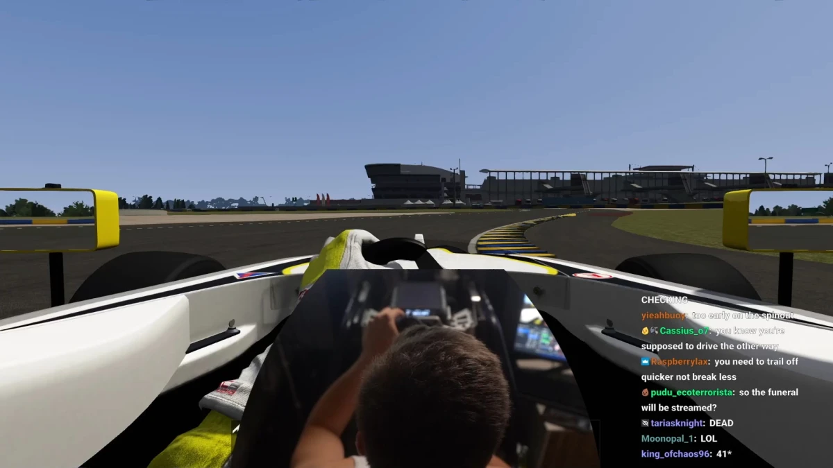 Racing simulator cockpit view on virtual racetrack