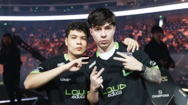 Two LOUD esports players pose at a tournament arena