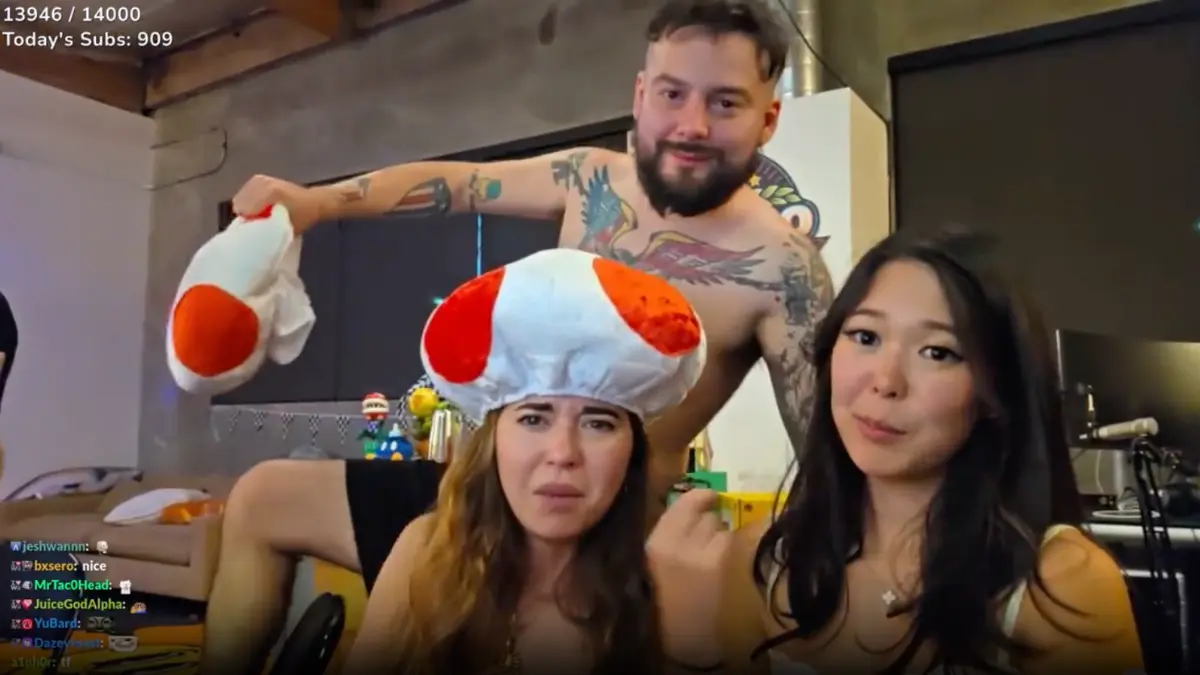 Three people with Toad hats celebrating on stream