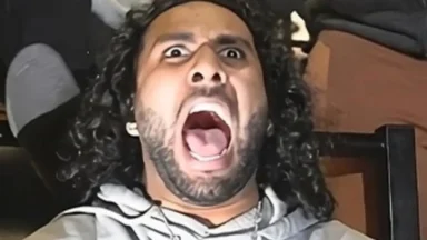 Man with wide eyes and open mouth