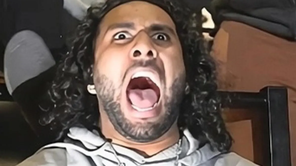 Man with wide eyes and open mouth