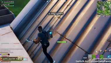 Fortnite player harvesting materials on rooftop