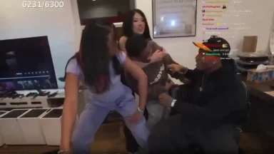 Group of friends playfully interacting in a living room.