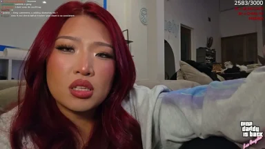 Person streaming from cozy living room setup