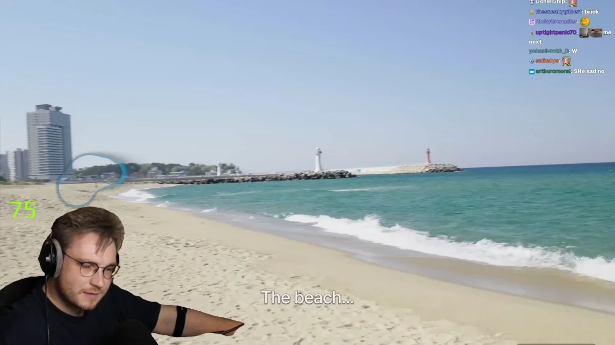 Streamer overlay on sunny beach with distant lighthouses