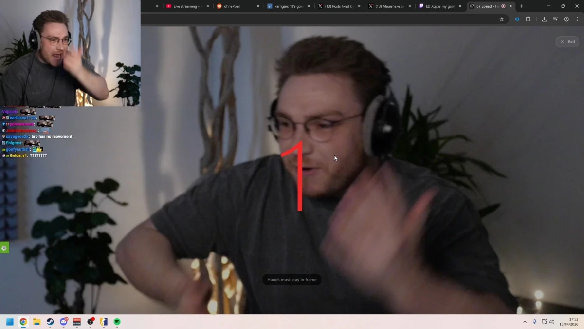 Streamer wearing headphones gesturing during live broadcast