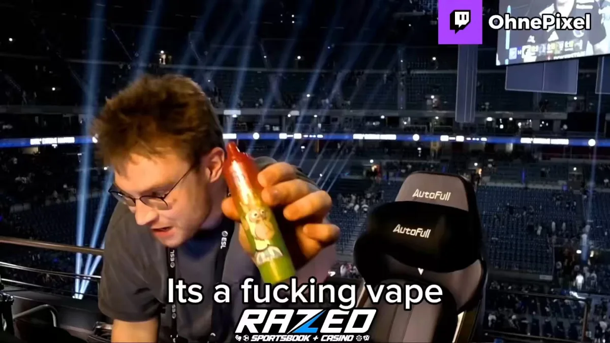 Man holding vape device at esports arena