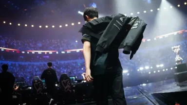 Esports player walking on stage in arena
