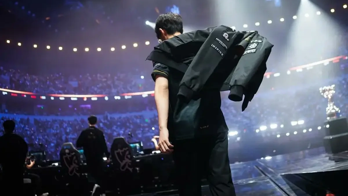 Esports player walking on stage in arena