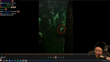 Streamer reacting to nightclub video with red circle highlight