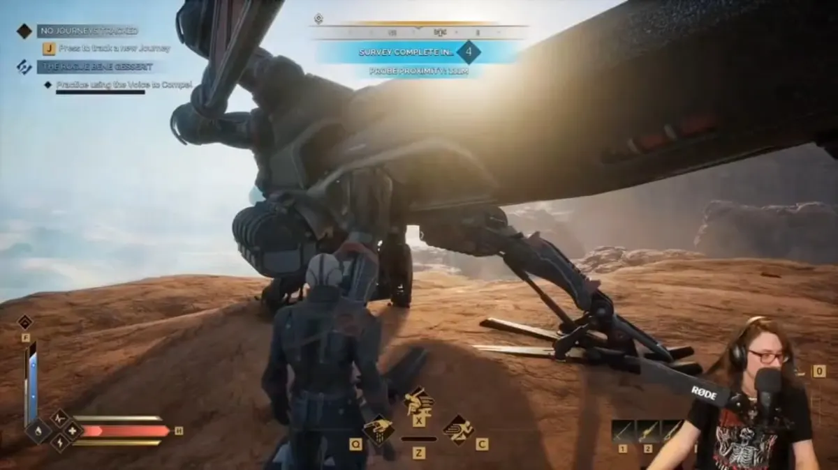 Gamer livestreaming sci-fi video game challenge.
