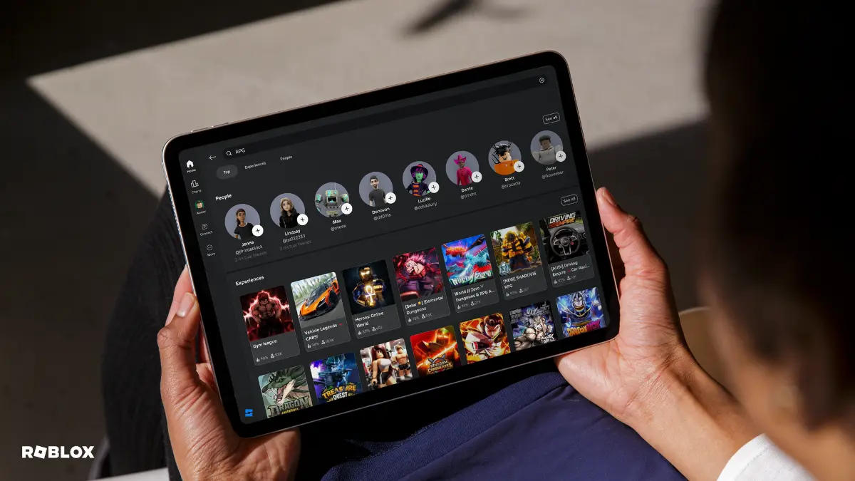 roblox predator runs on tablets Person browsing Roblox games on tablet.