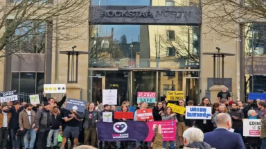 Protesters demonstrating outside Rockstar North building