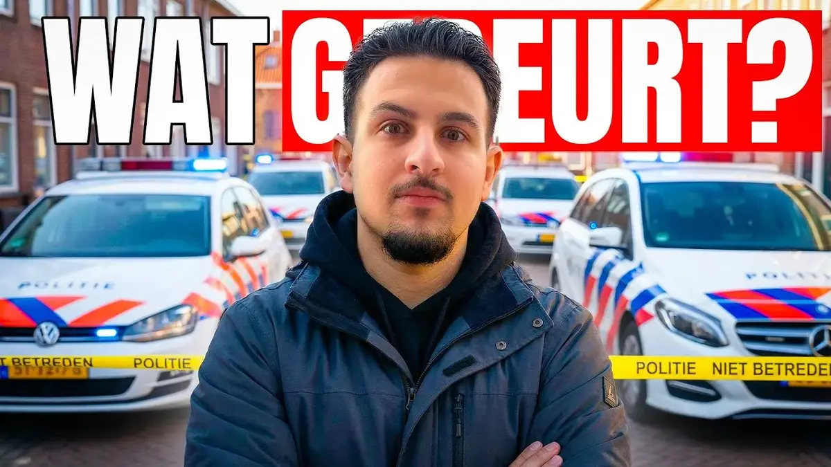 Man standing before Dutch police cars and tape