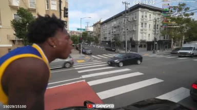 Man shouting at busy city street intersection