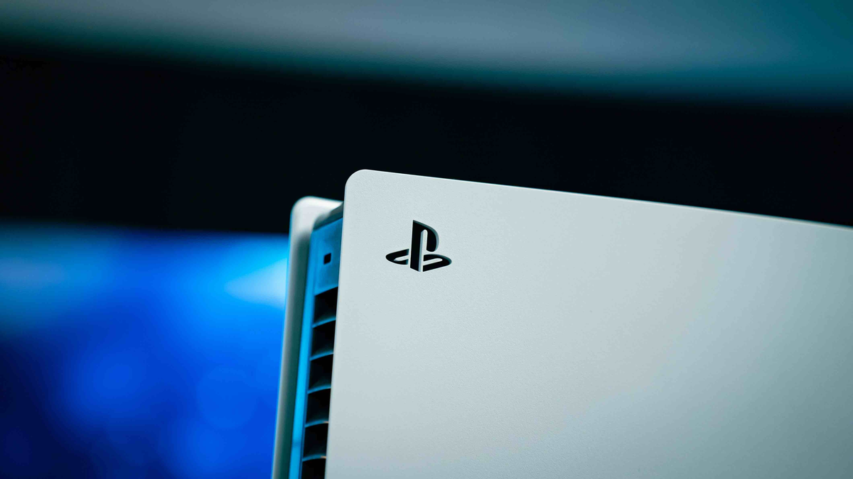 Close-up of white PlayStation 5 console with logo