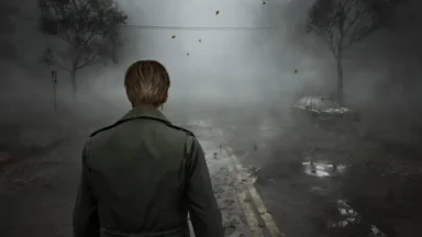 Man in coat walking through foggy abandoned street