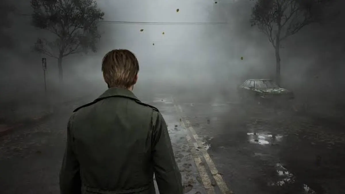 Man in coat walking through foggy abandoned street