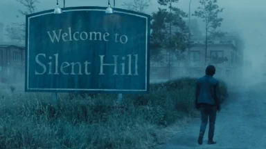 Person walking past Welcome to Silent Hill sign in fog