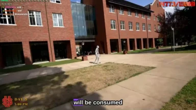 Person skateboarding in brick campus courtyard