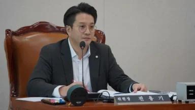 Man speaking at a conference table