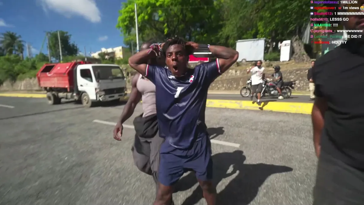 Man in soccer jersey reacting in street