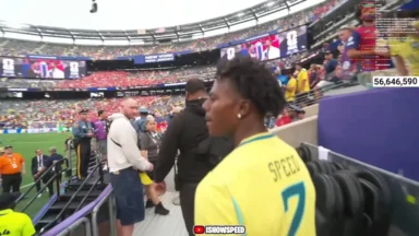 Man in yellow soccer jersey at stadium