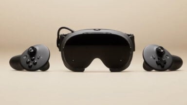 Black VR headset with two handheld controllers