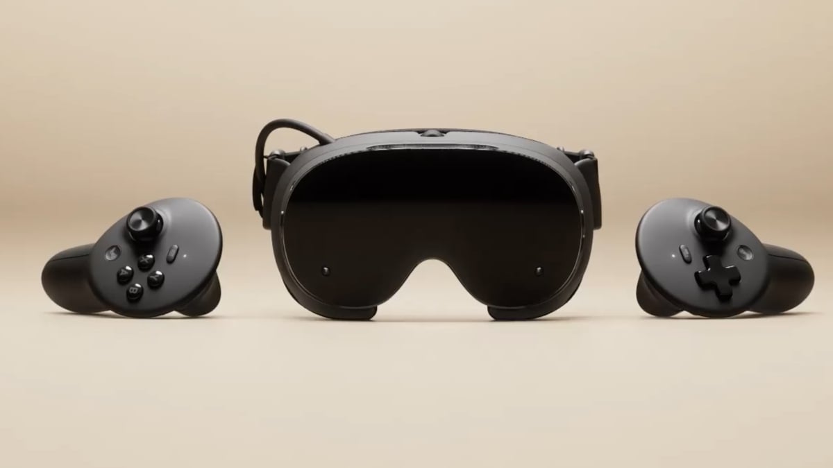 Black VR headset with two handheld controllers