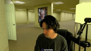 Man streaming in empty office-like backrooms setting