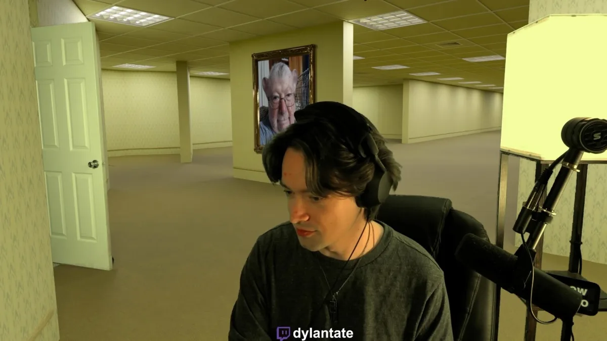 Man streaming in empty office-like backrooms setting