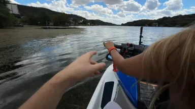 Riding a jet ski on a scenic lake