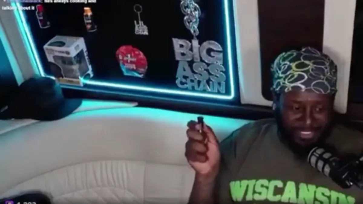 Man recording podcast with neon-lit backdrop