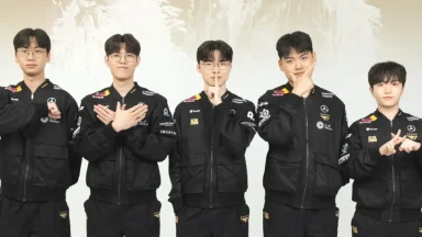 Esports team posing in black uniforms