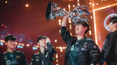 Esports team celebrating with championship trophy