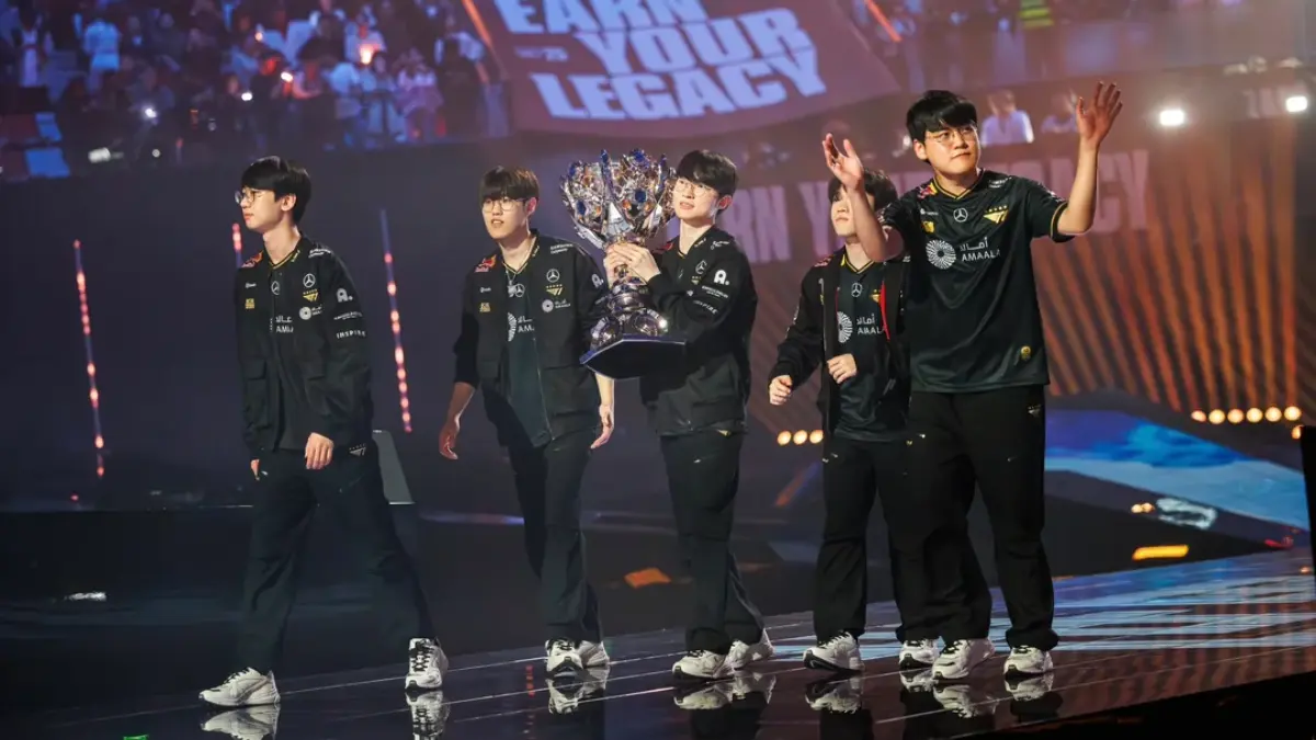 Esports team celebrates with championship trophy on stage