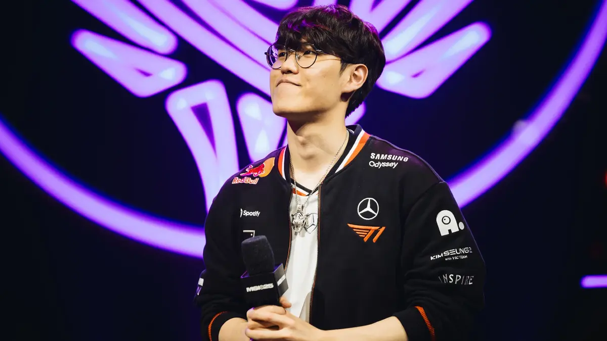 Esports player holding microphone on stage