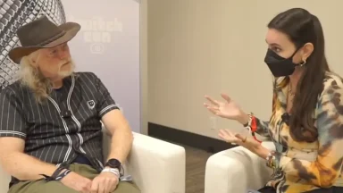 Two people talking during an interview at TwitchCon