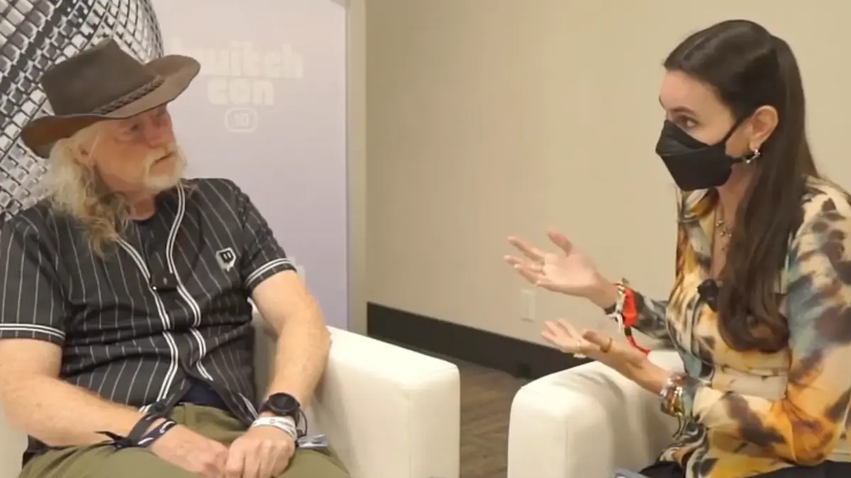 Two people talking during an interview at TwitchCon