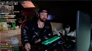 Streamer live with chat and microphone setup.