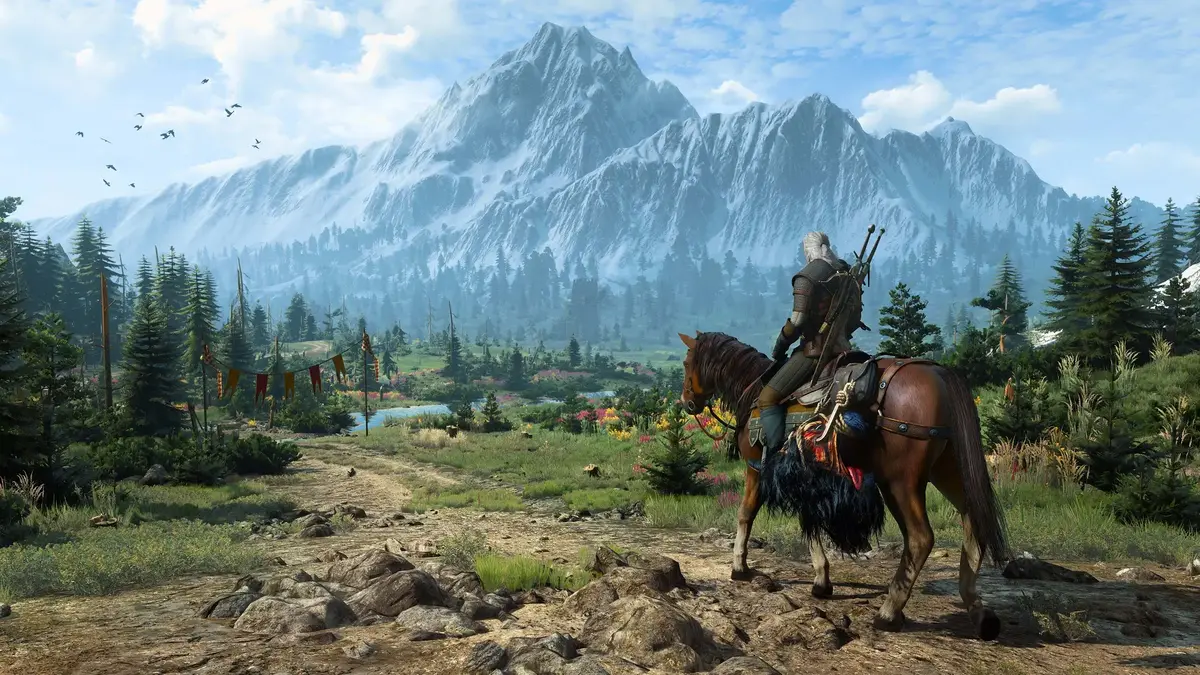 Armored rider on horseback overlooks snowy mountain valley