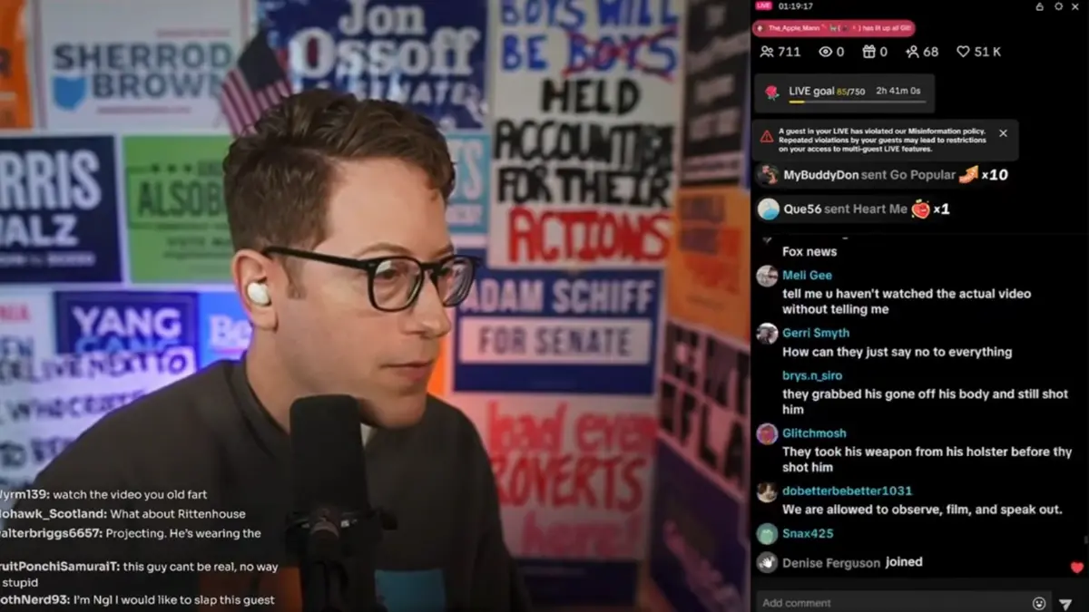 Man livestreaming with political posters background